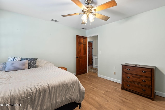 bedroom featuring ceiling fan and light wood-type flooring