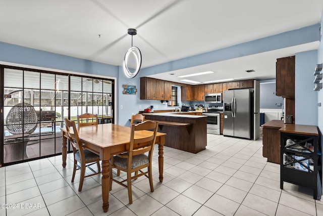 view of tiled dining space