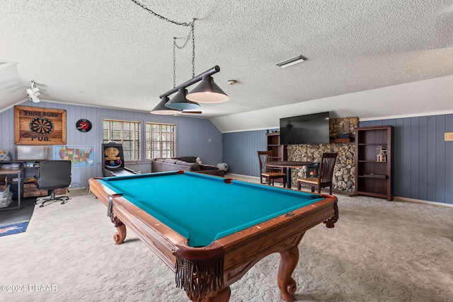 rec room with pool table, lofted ceiling, and a textured ceiling