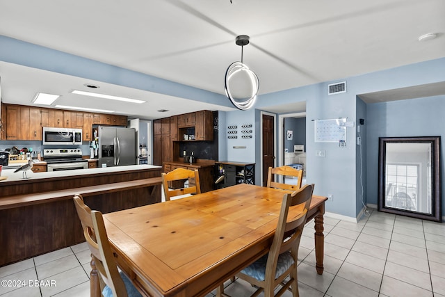 view of tiled dining area