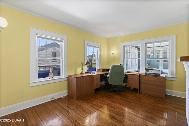 home office featuring crown molding and dark wood-type flooring