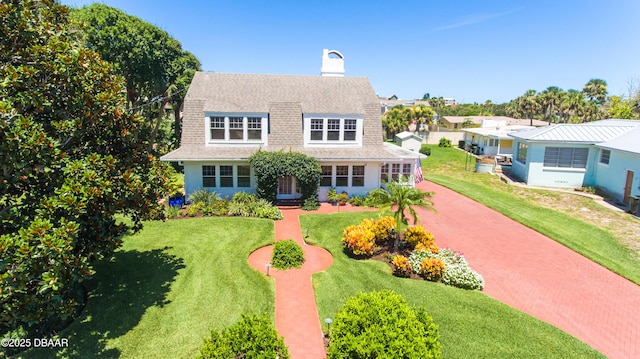 view of front of house with a front lawn