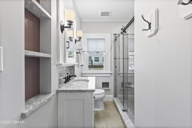 bathroom with tasteful backsplash, vanity, walk in shower, and toilet