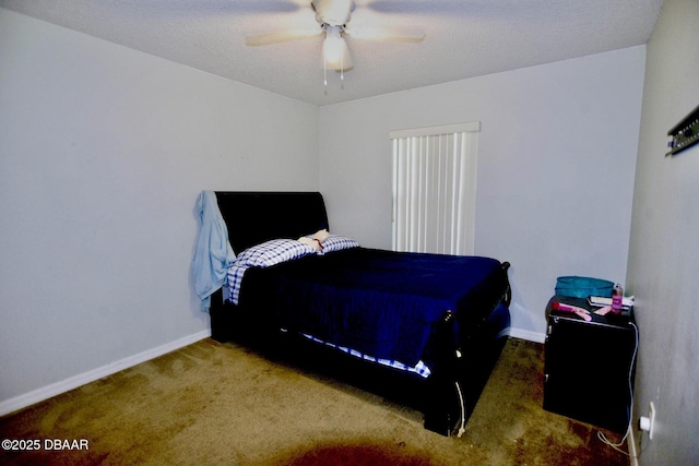 bedroom with carpet flooring, ceiling fan, a textured ceiling, and baseboards