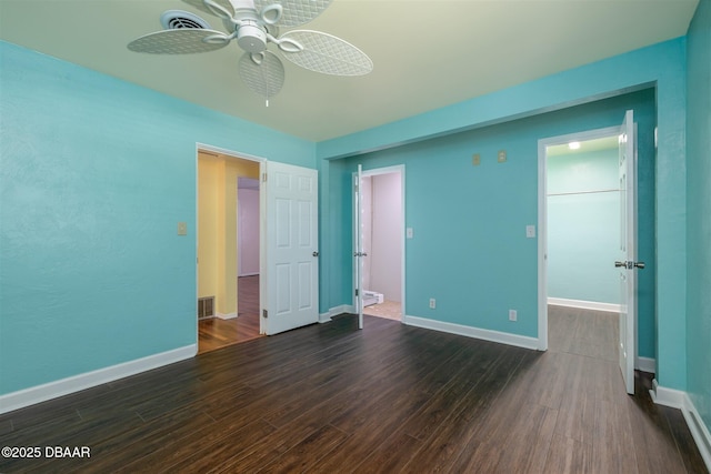 38 Lorillard Pl, Ormond Beach, FL 32174 - unfurnished bedroom featuring dark wood-style flooring and a ceiling fan