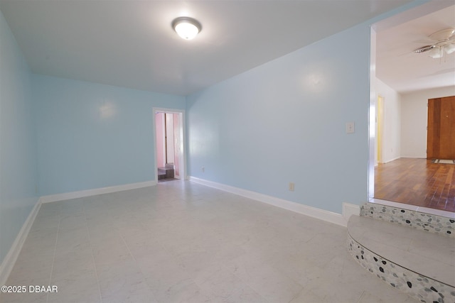 38 Lorillard Pl, Ormond Beach, FL 32174 - empty room featuring baseboards and a ceiling fan