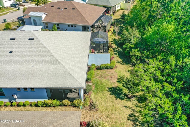 birds eye view of property with a residential view