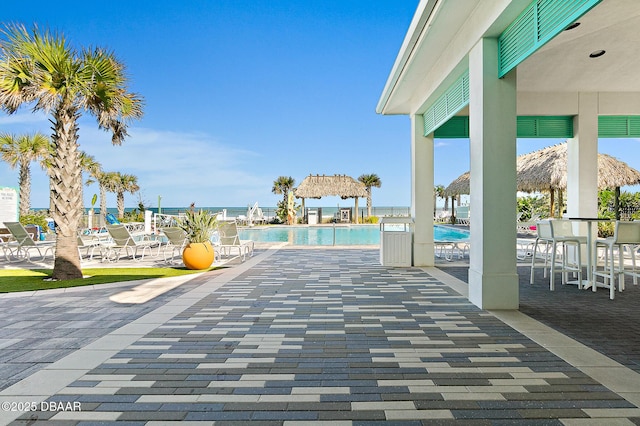 pool with a patio area