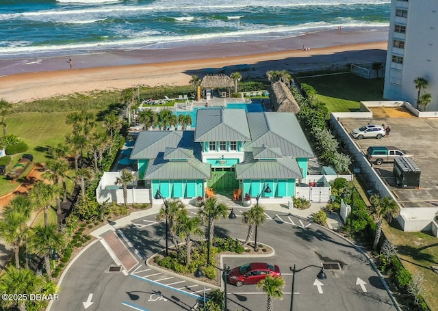 aerial view featuring a beach view and a water view