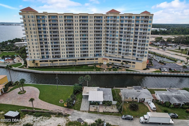 view of building exterior with a water view