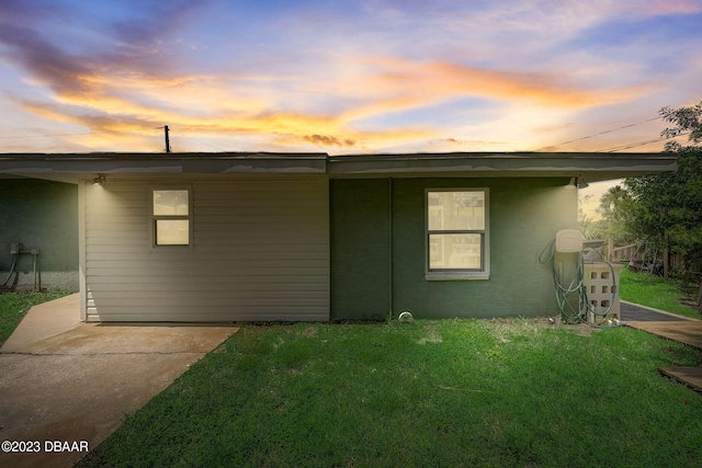 view of front of house with a lawn