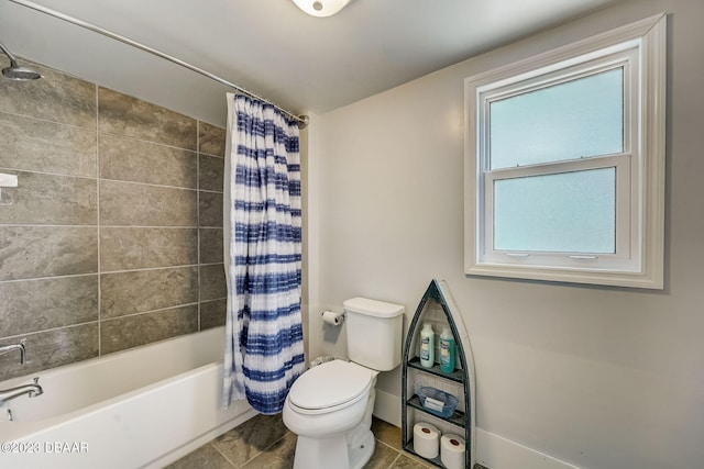 bathroom featuring shower / bathtub combination with curtain and toilet