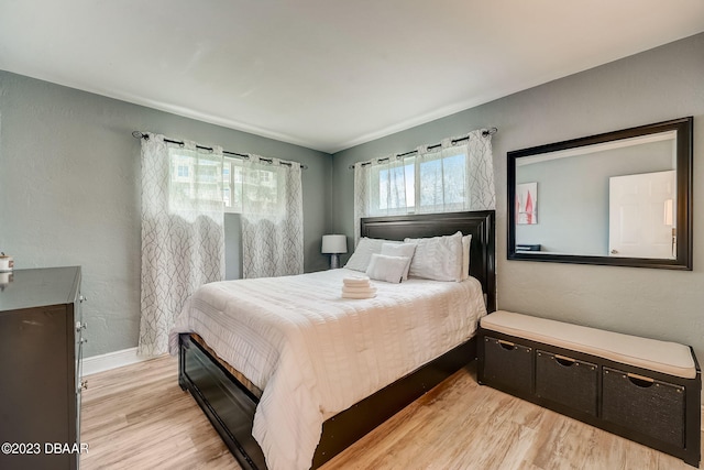 bedroom with light hardwood / wood-style floors