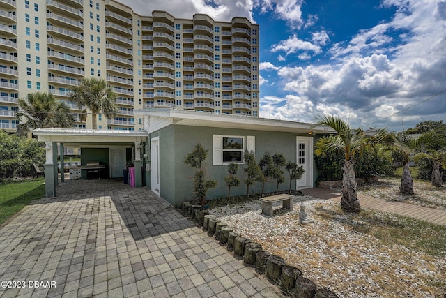 view of front of house with a carport