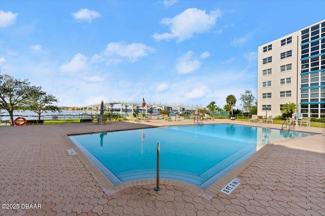 view of swimming pool featuring a patio