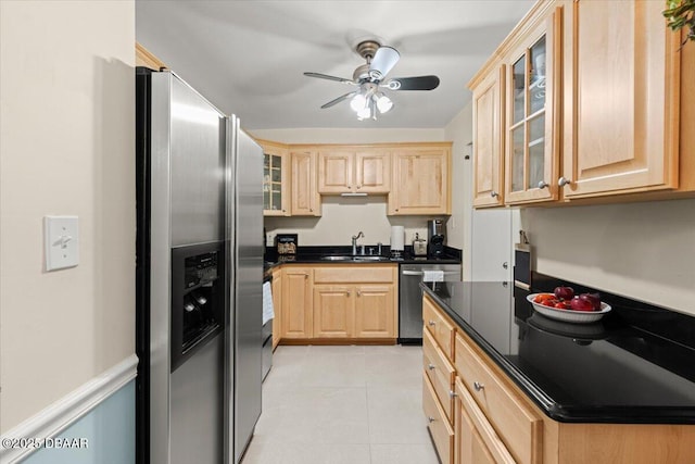 kitchen with ceiling fan, sink, light brown cabinets, stainless steel appliances, and light tile patterned floors