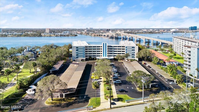 drone / aerial view featuring a water view