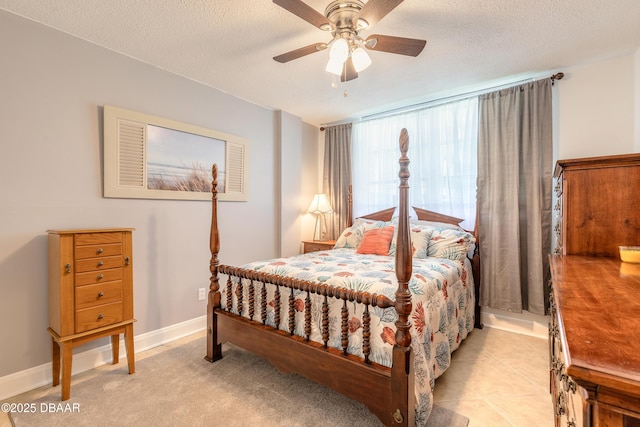 2727 N Atlantic Ave Unit 107, Daytona Beach, FL 32118 - bedroom with ceiling fan and a textured ceiling