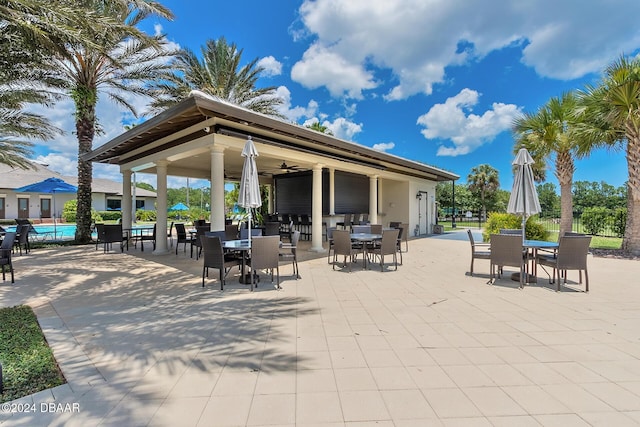 view of patio / terrace featuring a gazebo and ceiling fan