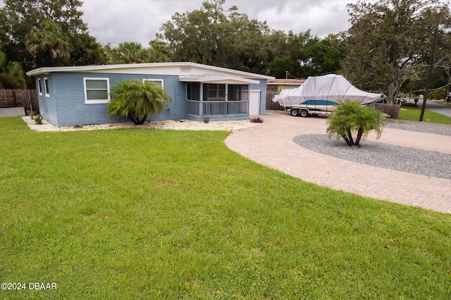 view of front facade with a front lawn