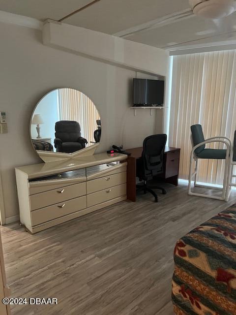 home office featuring light hardwood / wood-style floors