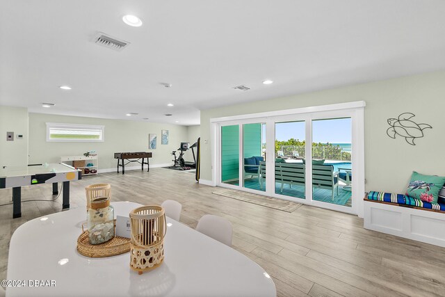 dining room with light hardwood / wood-style floors