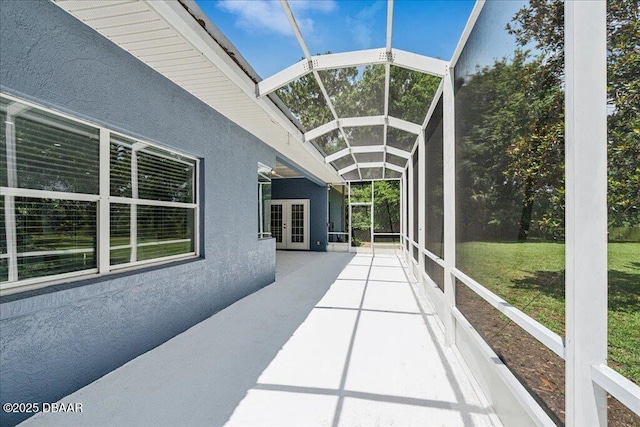 49 Ludlow Ln W W, Unit W, Palm Coast, FL 32137 - unfurnished sunroom with french doors and lofted ceiling