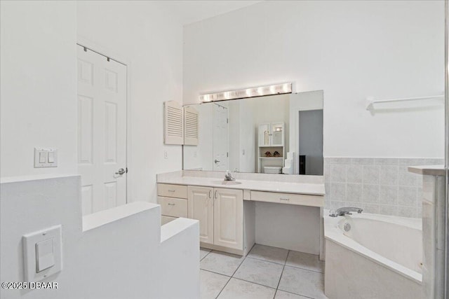 49 Ludlow Ln W W, Unit W, Palm Coast, FL 32137 - full bath with a bath, vanity, and tile patterned floors