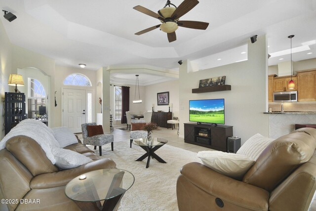 2141 Springwater Ln, Port Orange, FL 32128 - living room featuring ceiling fan, a tray ceiling, recessed lighting, and light tile patterned floors