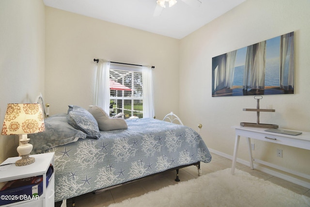 2141 Springwater Ln, Port Orange, FL 32128 - tiled bedroom with baseboards and a ceiling fan