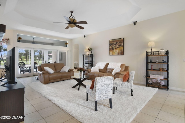 2141 Springwater Ln, Port Orange, FL 32128 - living room featuring a ceiling fan and light tile patterned flooring