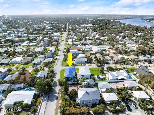 aerial view featuring a residential view and a water view