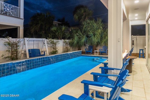 view of pool featuring a fenced in pool, a patio, and a fenced backyard