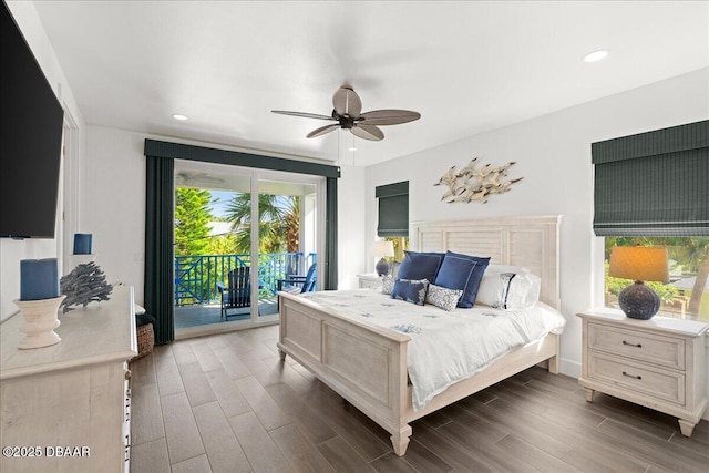 bedroom with dark wood-type flooring, access to outside, and ceiling fan