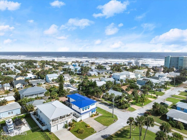 aerial view featuring a residential view and a water view