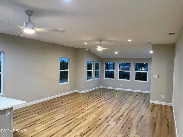 unfurnished room featuring light wood-type flooring and ceiling fan