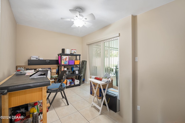 office area featuring light tile patterned flooring and ceiling fan