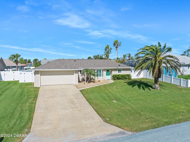 single story home featuring a front lawn and a garage