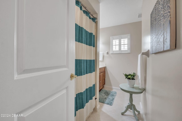 bathroom featuring tile patterned flooring