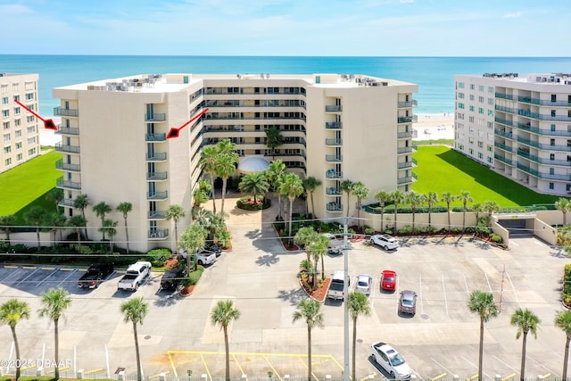 view of building exterior with a water view