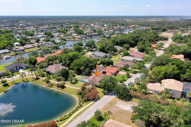 bird's eye view with a residential view and a water view