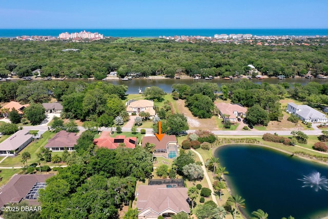 drone / aerial view with a water view