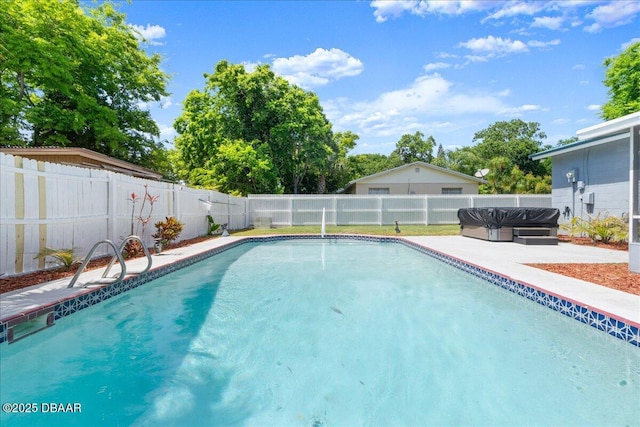 view of pool with a patio area, a fenced in pool, and a fenced backyard