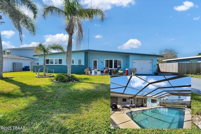 34 Dolphin Ave, Ormond Beach, FL 32176 - back of property with a garage, a lanai, and a patio area