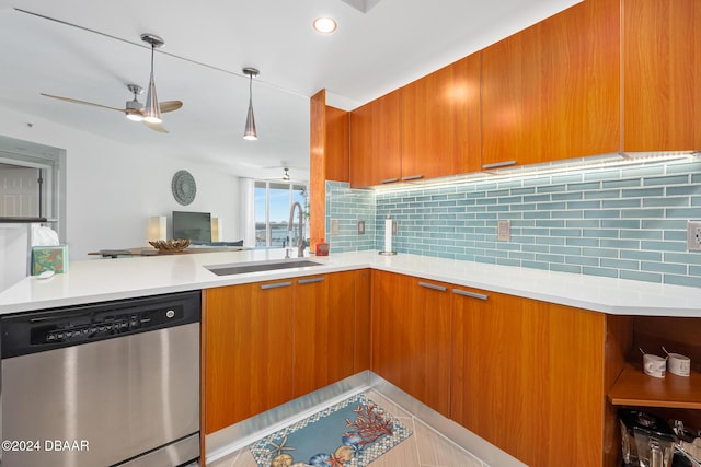 231 Riverside Dr Unit 1903-1, Daytona Beach, FL 32117 - kitchen featuring stainless steel dishwasher, a sink, brown cabinets, modern cabinets, and a ceiling fan