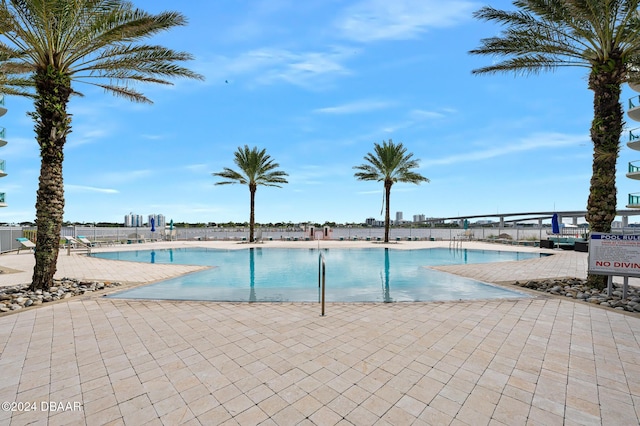 231 Riverside Dr Unit 1903-1, Daytona Beach, FL 32117 - community pool with fence and a patio
