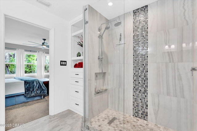 2 Bulows Lndg, Flagler Beach, FL 32136 - bathroom with connected bathroom, a stall shower, and a ceiling fan