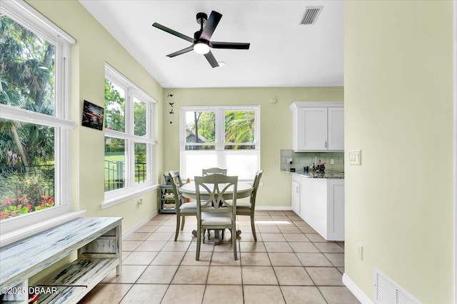 2 Bulows Lndg, Flagler Beach, FL 32136 - dining space with baseboards, light tile patterned floors, and ceiling fan