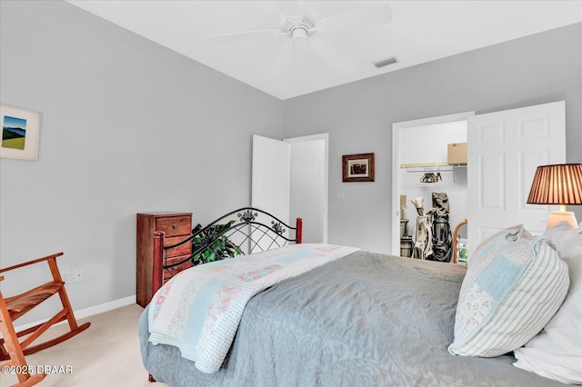 2 Bulows Lndg, Flagler Beach, FL 32136 - carpeted bedroom featuring a ceiling fan, a closet, a walk in closet, and baseboards