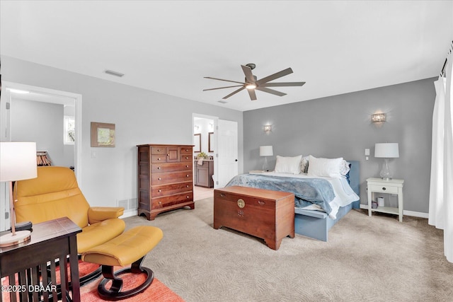 2 Bulows Lndg, Flagler Beach, FL 32136 - carpeted bedroom with baseboards, ensuite bathroom, and ceiling fan